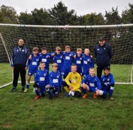Budding football stars in Burghfield kick-off in brand-new kit thanks to housebuilder